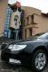 Skoda Superb przed ratuszem