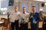 Foto: Zawodnicy MMA, w środku Damian Zorczykowski, po prawej Przemysław Boński z firmy Sonarol